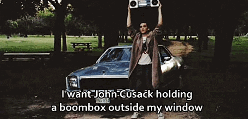 John Cusack holding a boombox over his head